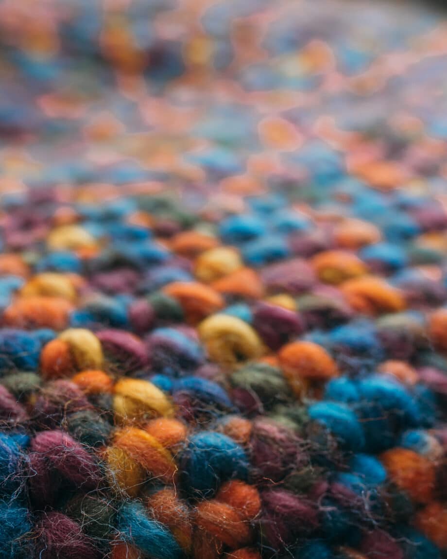 Rainbow pouf close up, rainbow pouf knitting