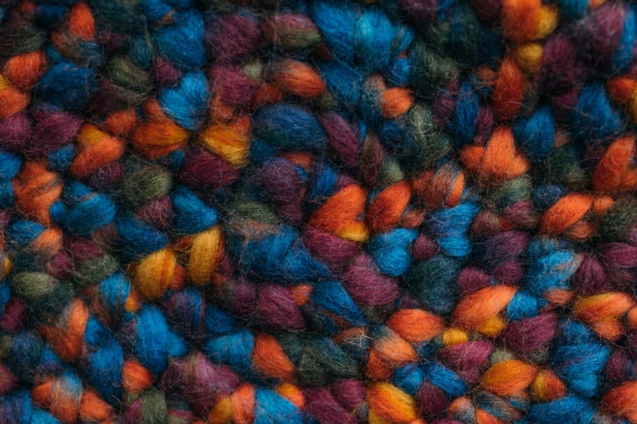 Knitted pouf close-up, rainbow pouf close-up