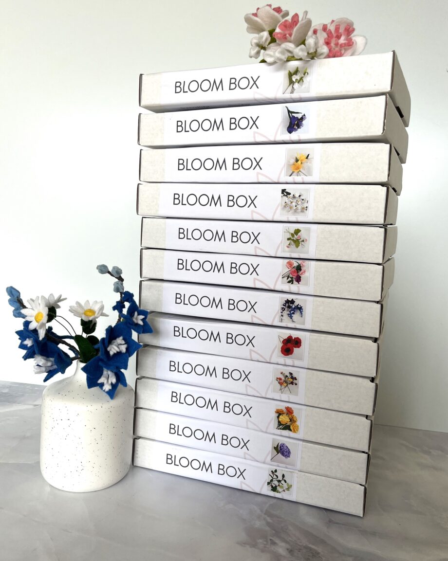 Viltbloemen bloombox groepsfoto van de dozen van de viltbloemist bloomboxen